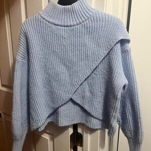 Blue cropped sweater with v-back